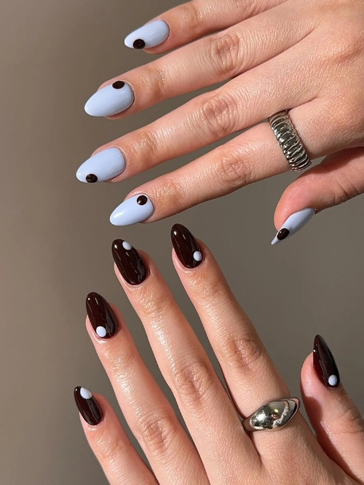 pale blue and espresso almond nails with dot accents
