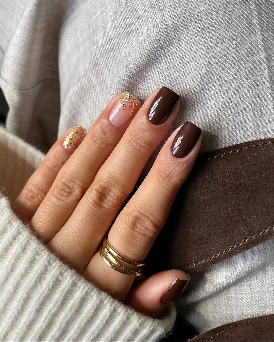 chocolate brown square nails with gold glitter accents