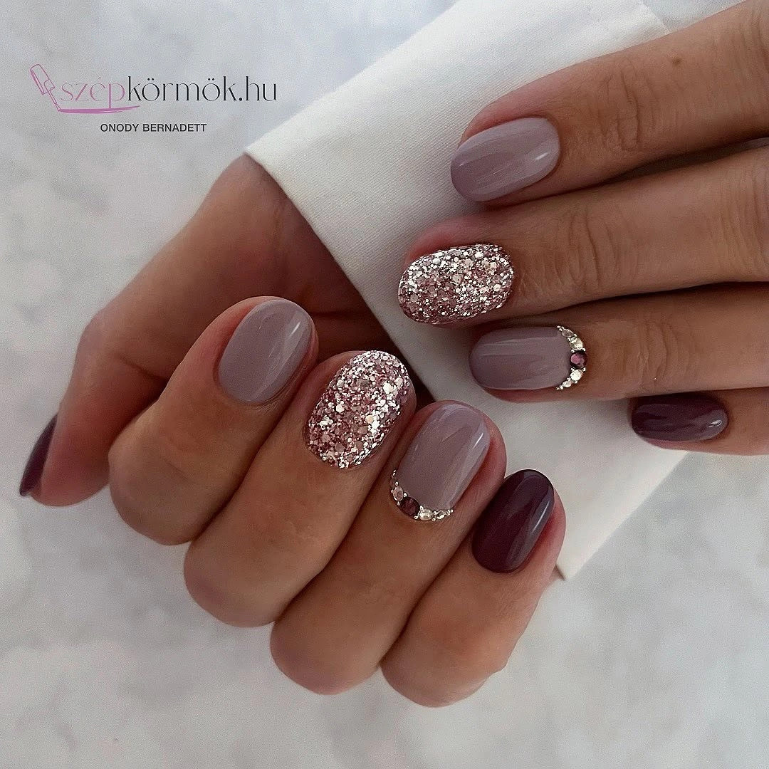 mauve plum short nails with glitter and stone arcs
