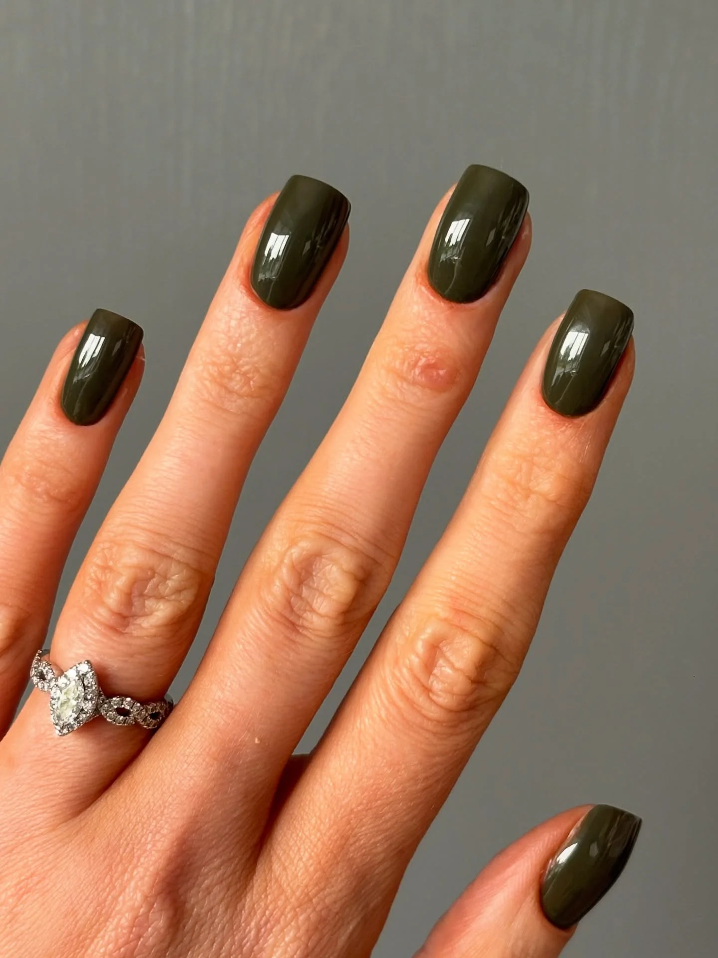 deep olive short squoval nails with high shine