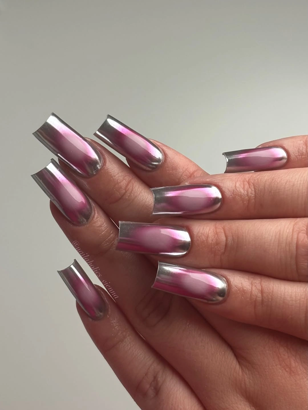 Long pink square nails with dark angled linear French details