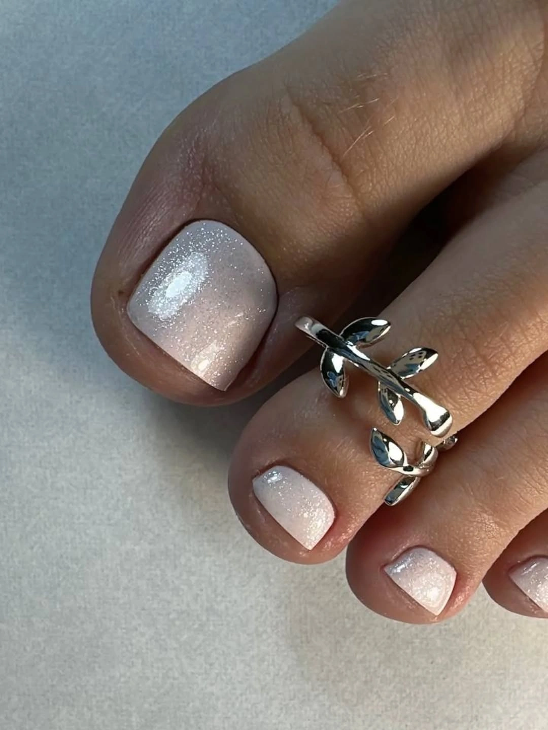 Translucent pearly white pink short square toenails
