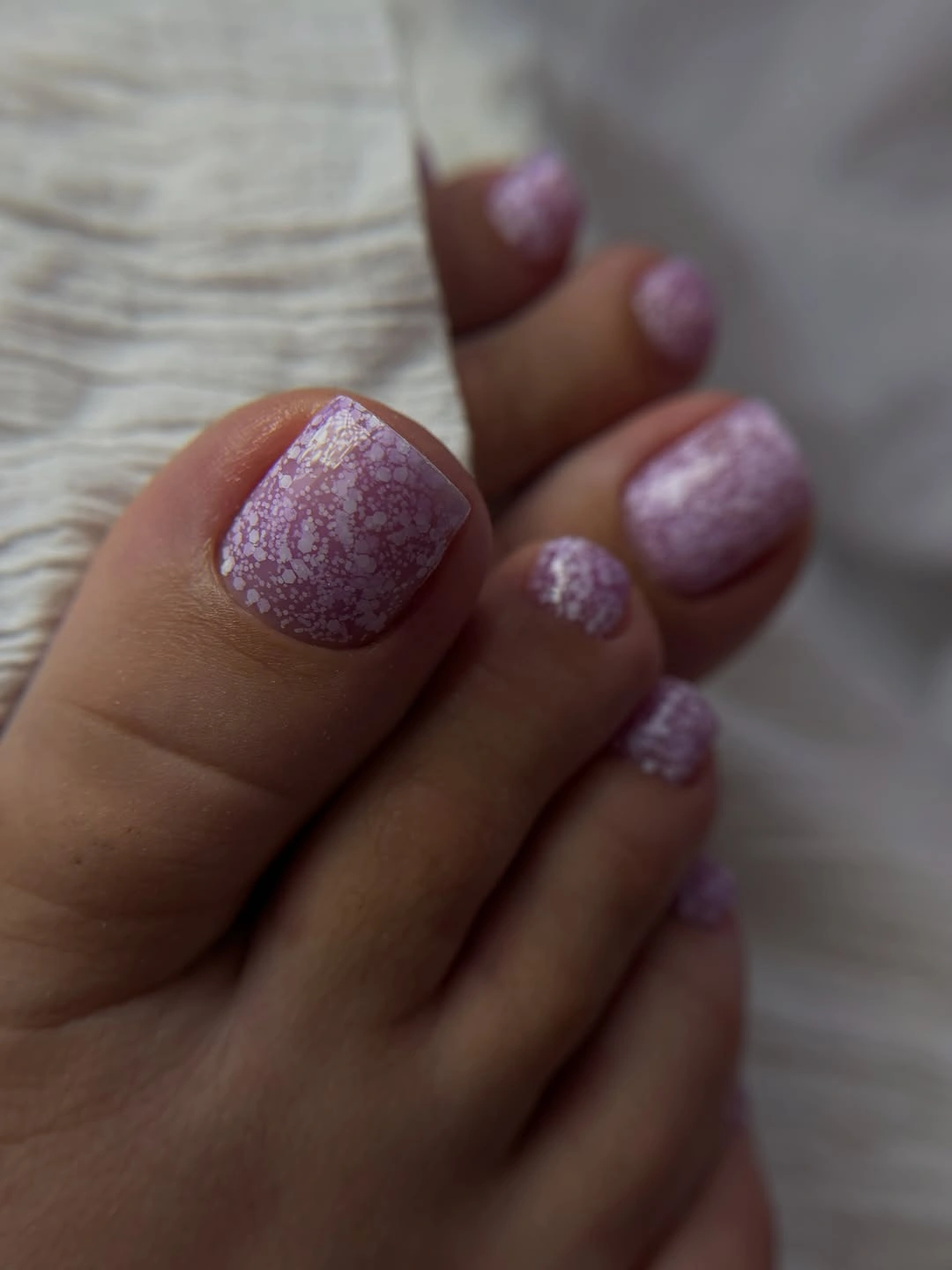 Muted lavender purple short square toenails with fine glitter