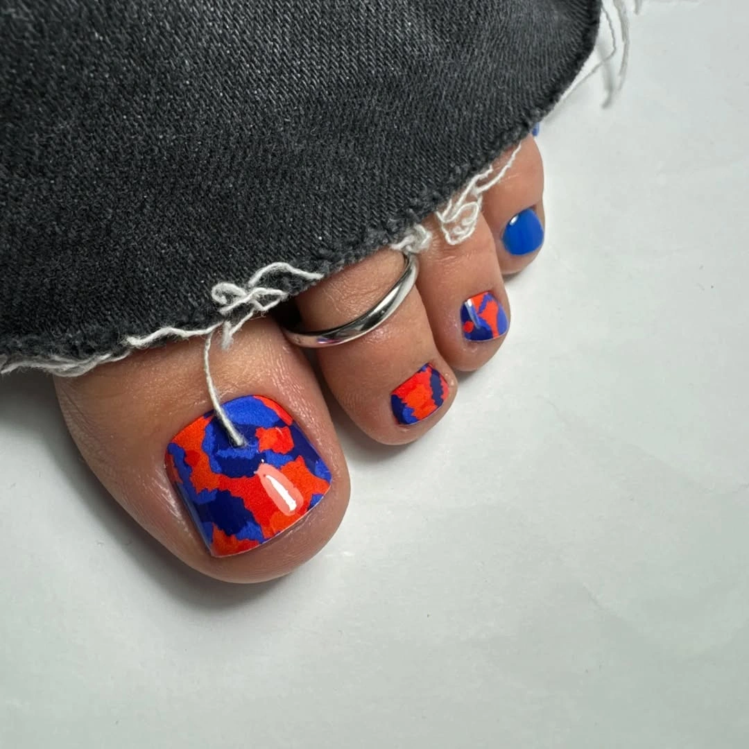 Vivid orange and blue graphic square toenails