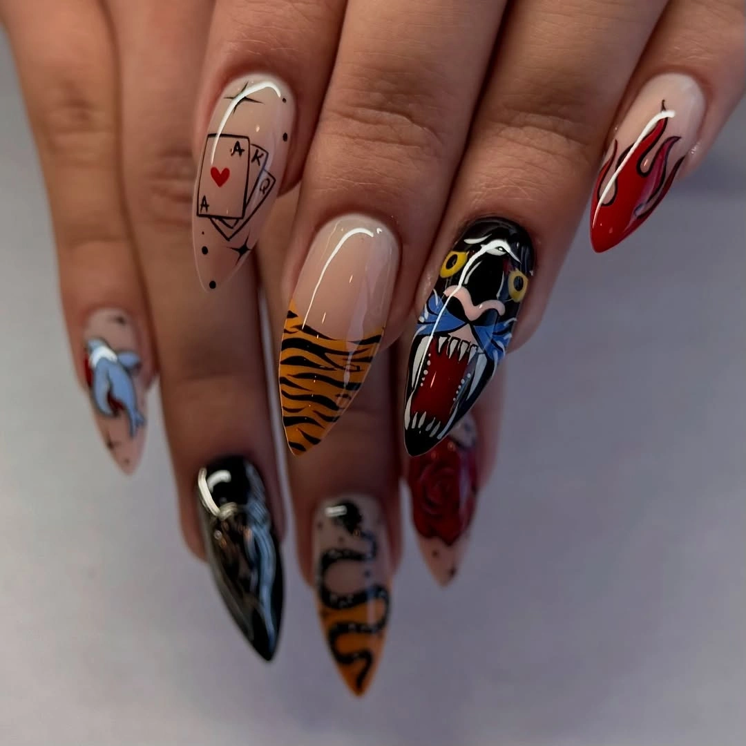 Multicolor stiletto nails with graphic and animal-inspired details