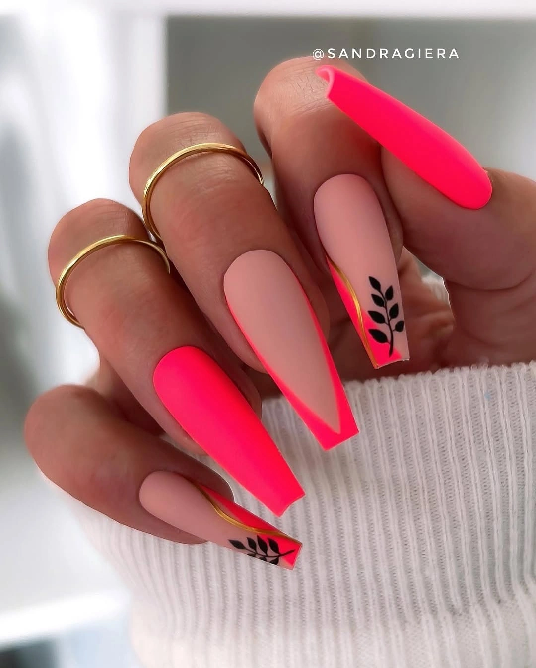 Long nude coffin nails with neon pink graphic tips