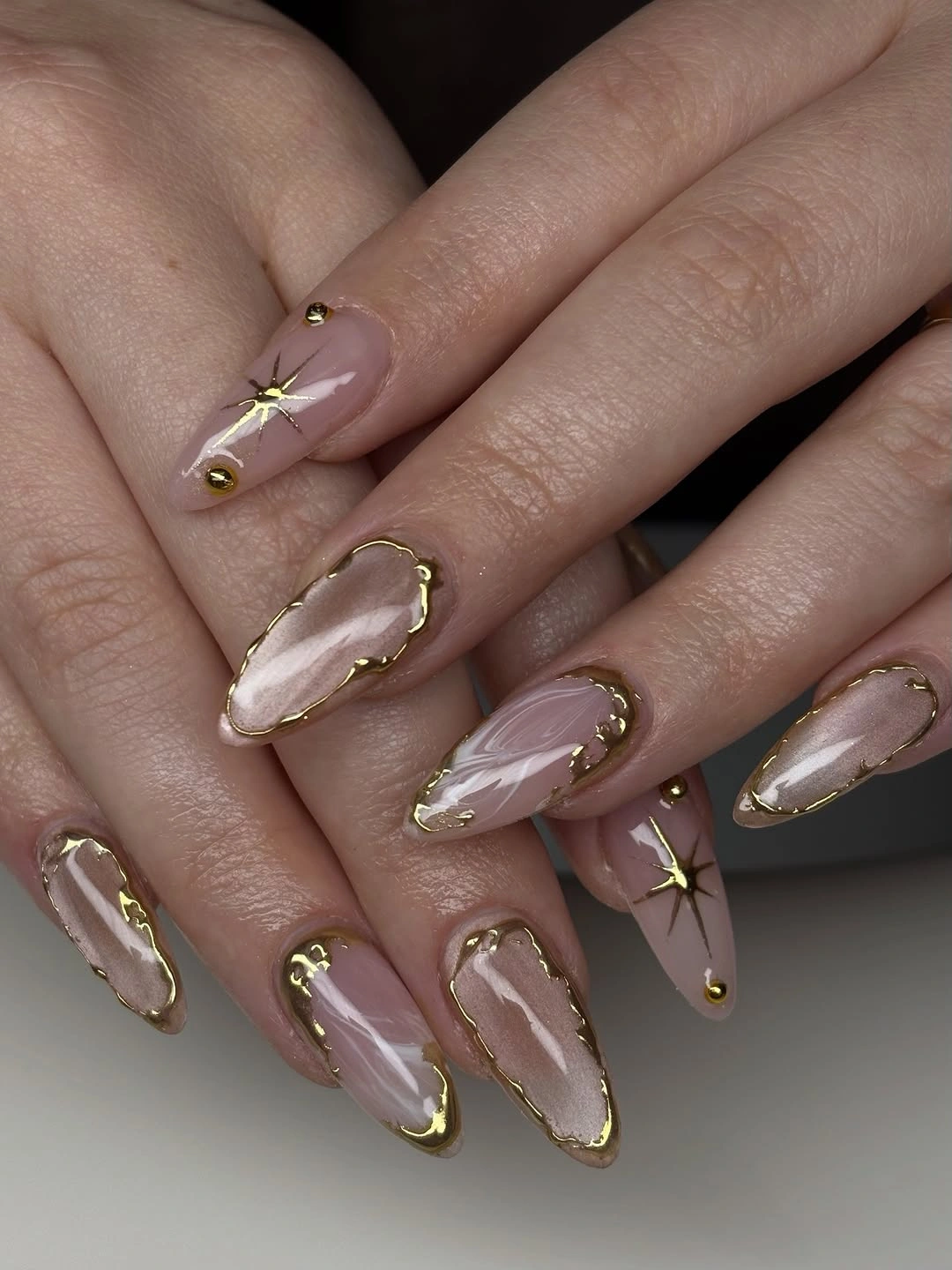 White blush stiletto wedding nails with silver pointed accents