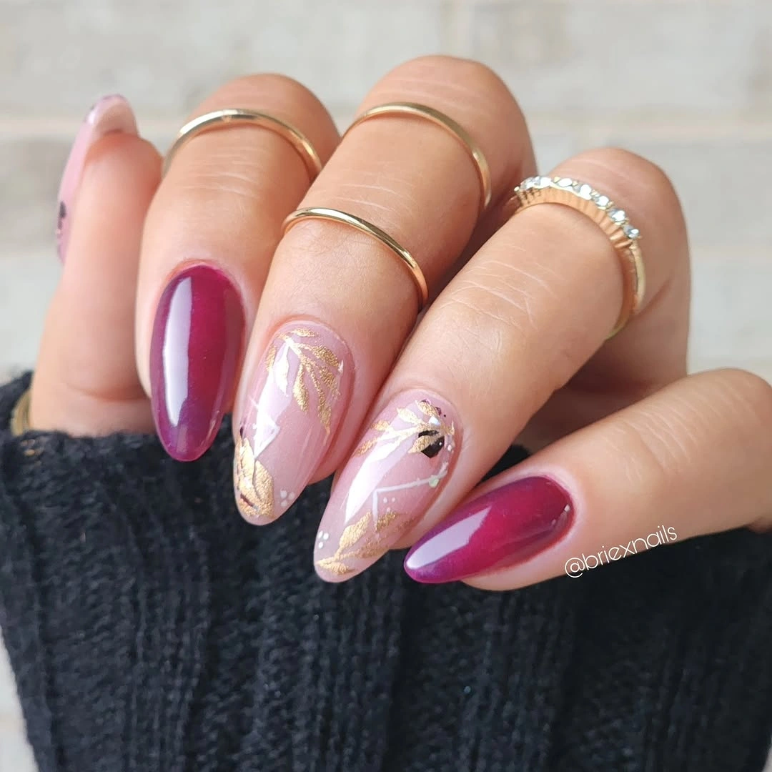 Pink almond wedding nails with fine gold starburst lines