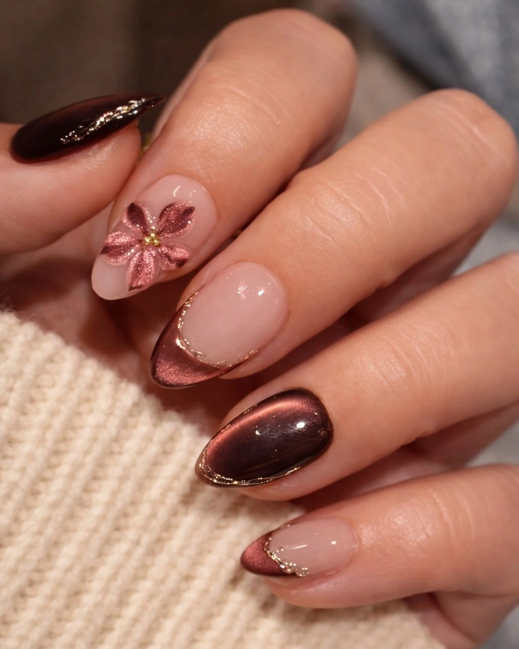 Berry and nude almond wedding nails with one floral accent