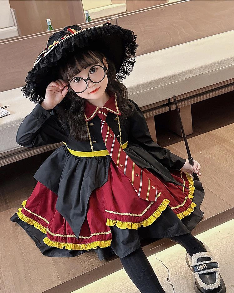 Kids black and red school-style witch costume with pointed hat glasses striped socks and boots