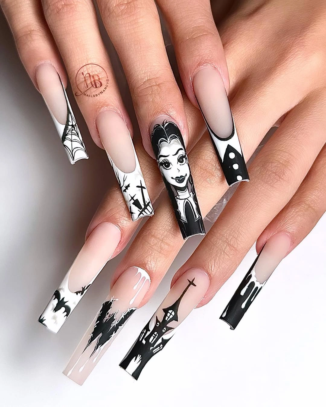 Extra long square nails with black white gothic panels and webs