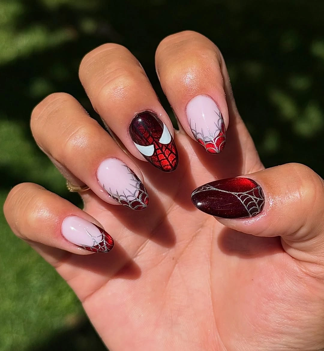 Red black and white almond nails with pale ghost accents