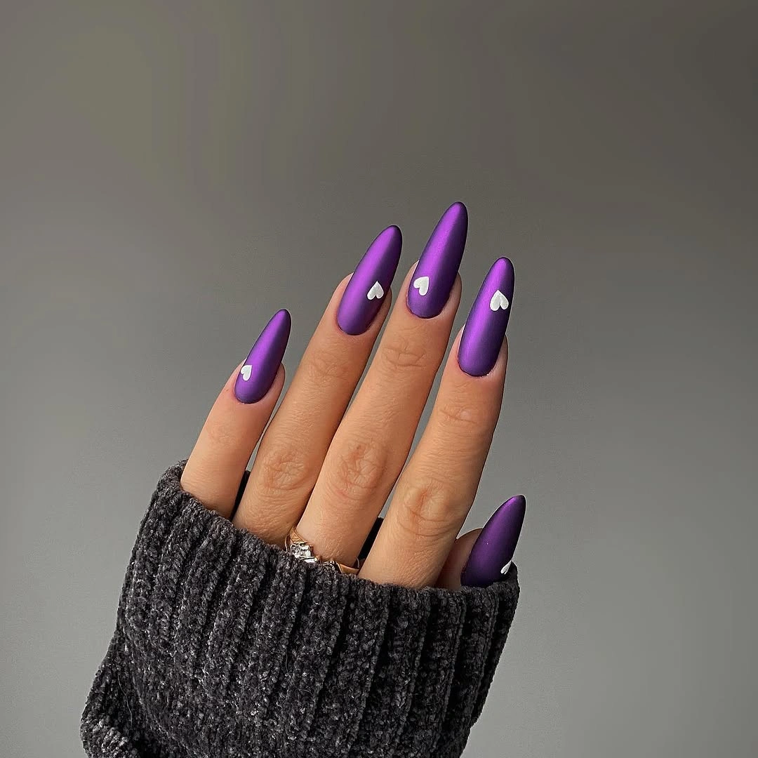 Pointed purple almond nails with black diagonal glossy accents