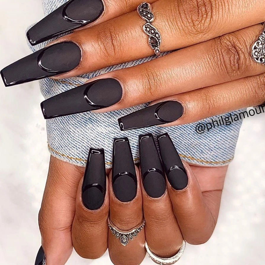 Long black square nails with glossy panels and circle cutouts