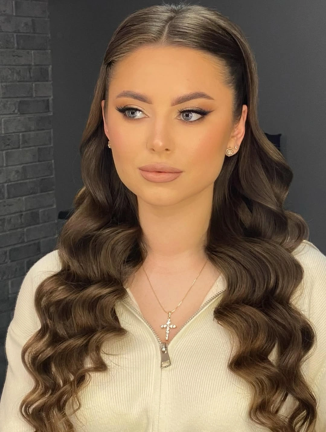 Long brown middle part waves with polished curled ends