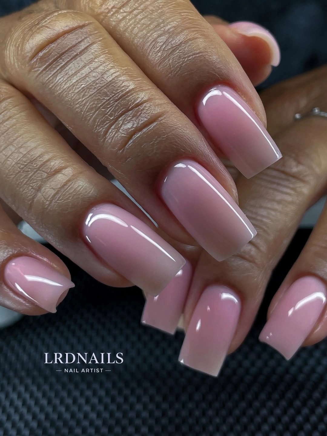 Medium square nails in a uniform dusty pink mauve shade