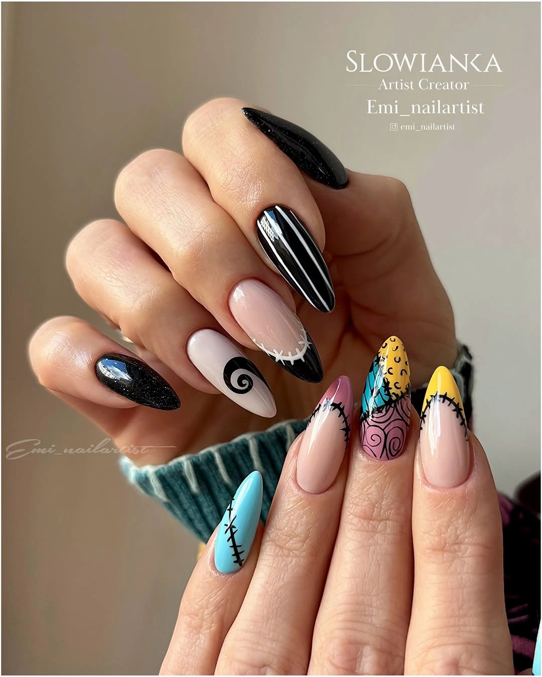 Long almond nails with black nude blue yellow pink and spooky character art