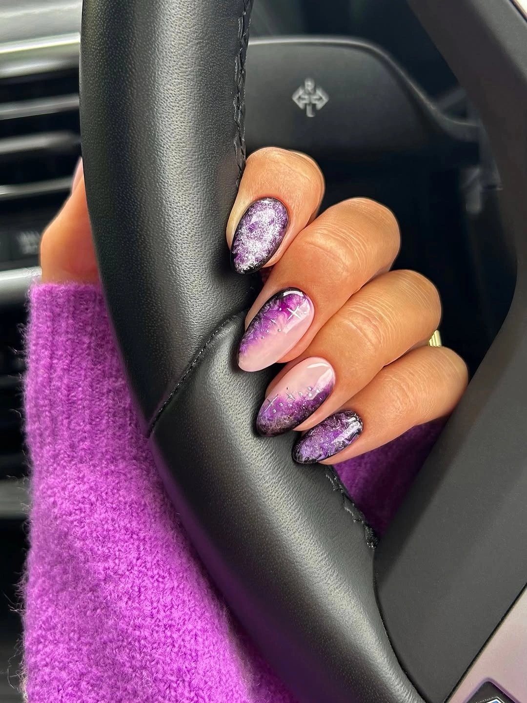 Medium almond nails with reflective purple and soft pink gradient color
