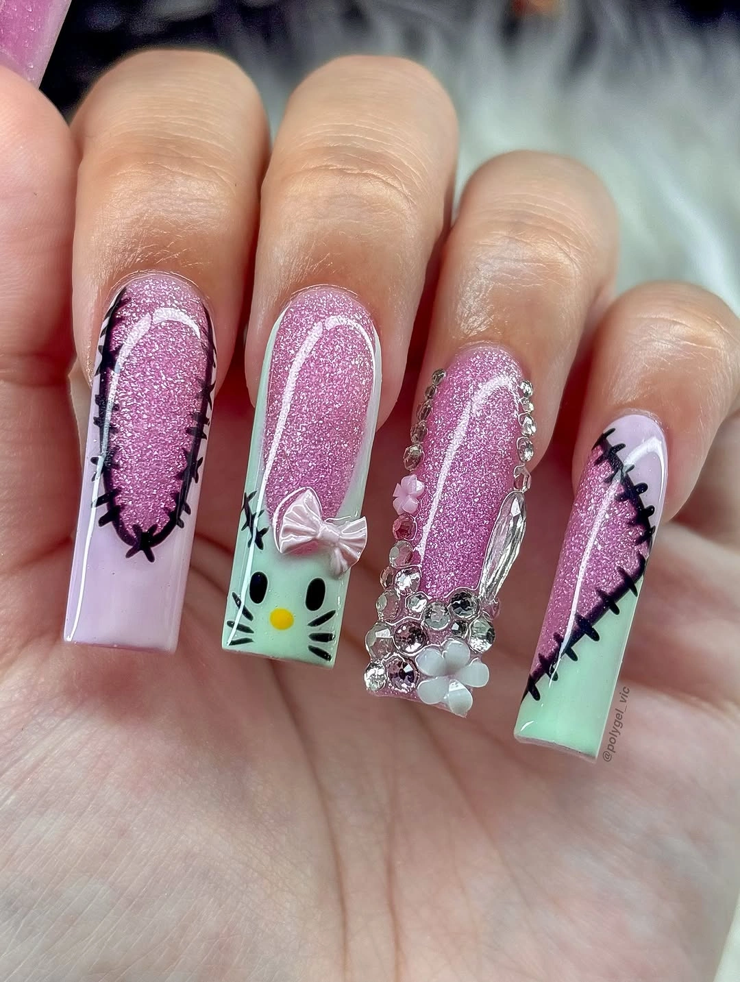 Extra long pastel square nails with black stitches bow and bead details