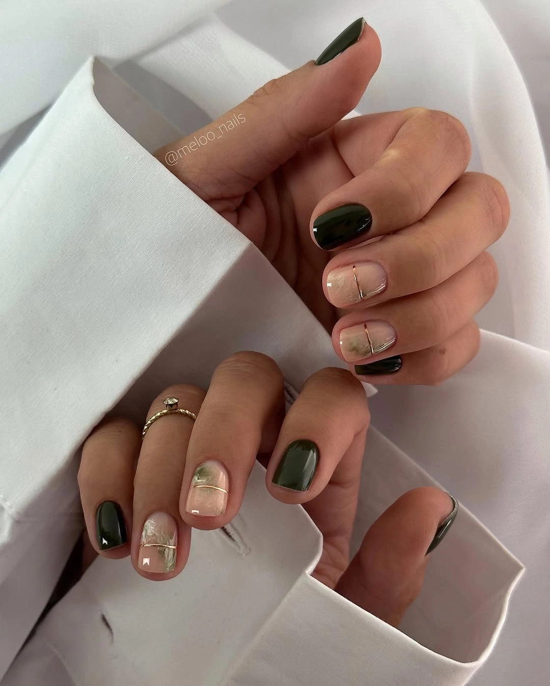 Short olive black nude and metallic gold mixed nails