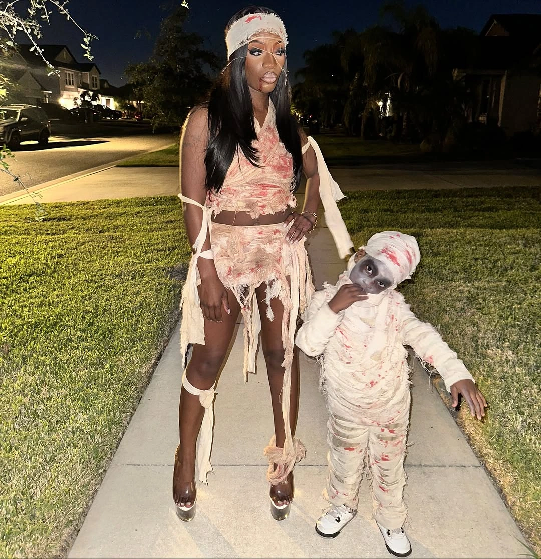 Pale mummy-style Halloween duo with distressed-looking layers and matching head scarves
