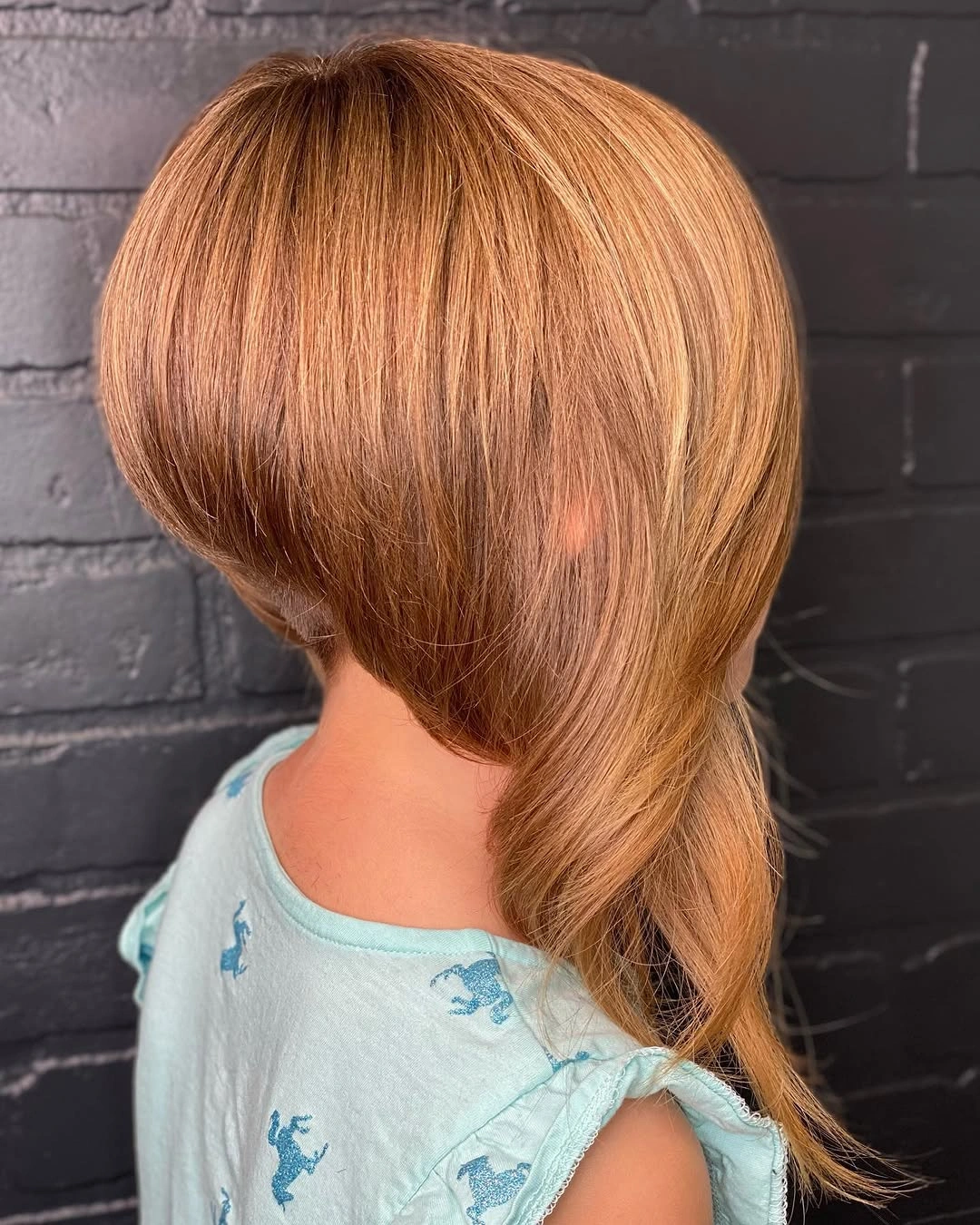 Warm copper rounded bob with swept side extension
