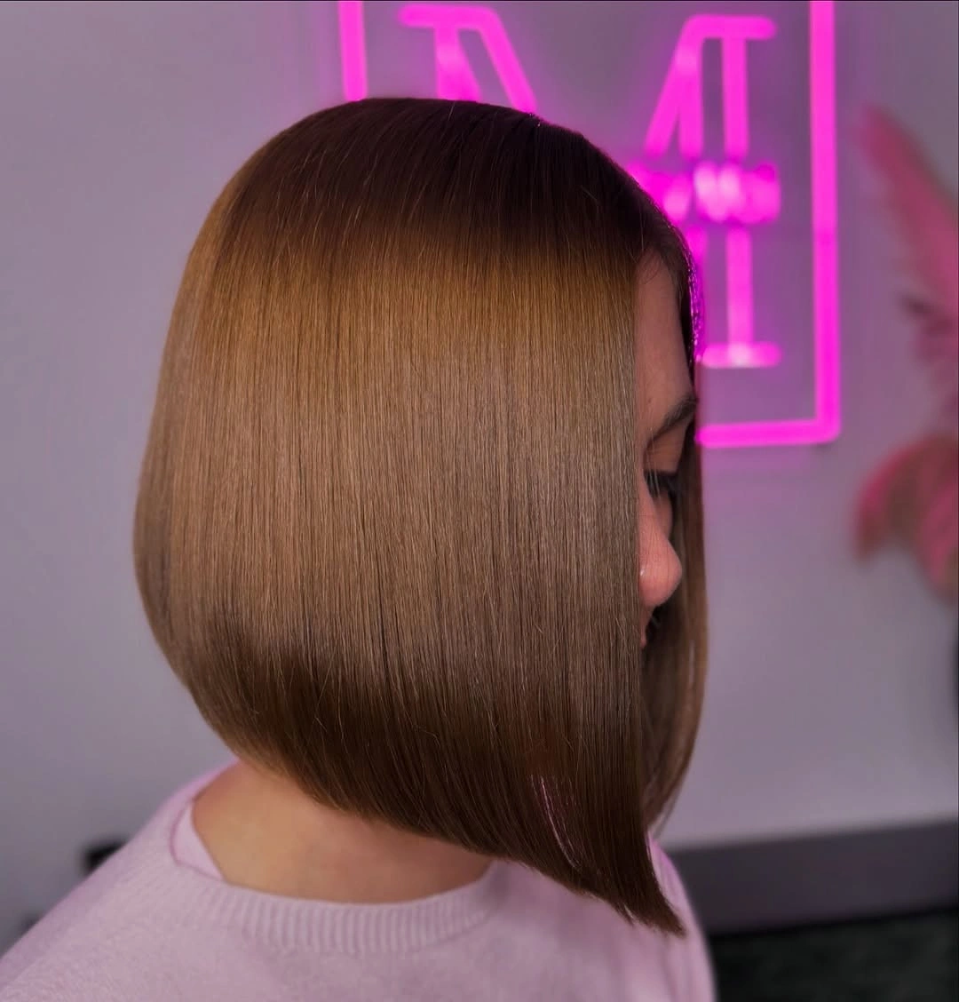 Warm brown long A-line bob with smooth rounded back