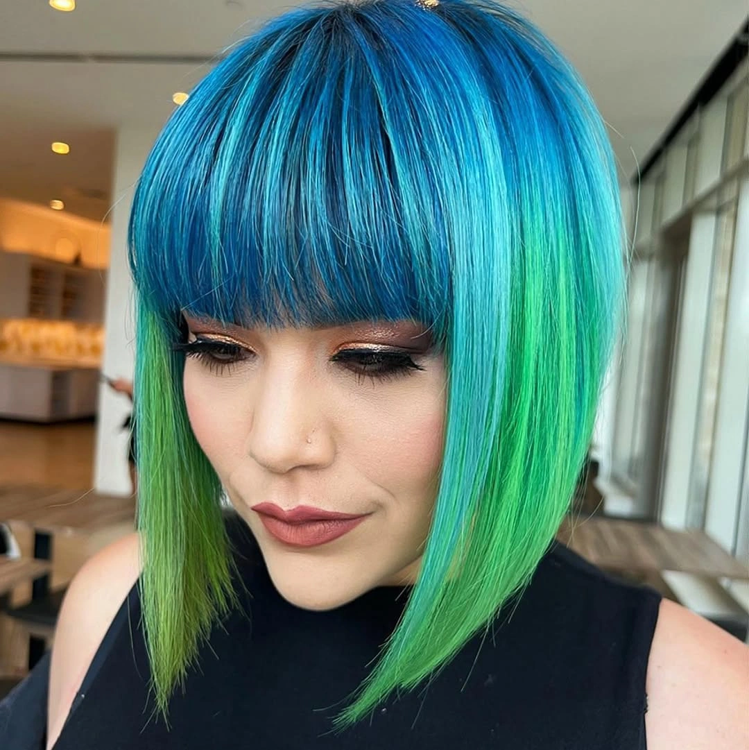 Blue and green short bob with full bangs