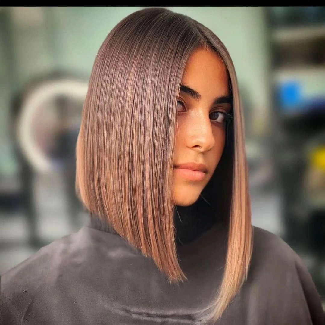 Smooth rose beige angled bob with center part