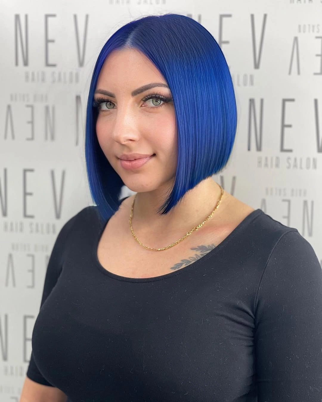 Vivid blue chin-length bob with center part and blunt edge