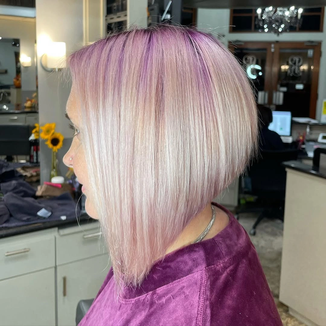 Pale blonde angled bob with lavender top and long front point