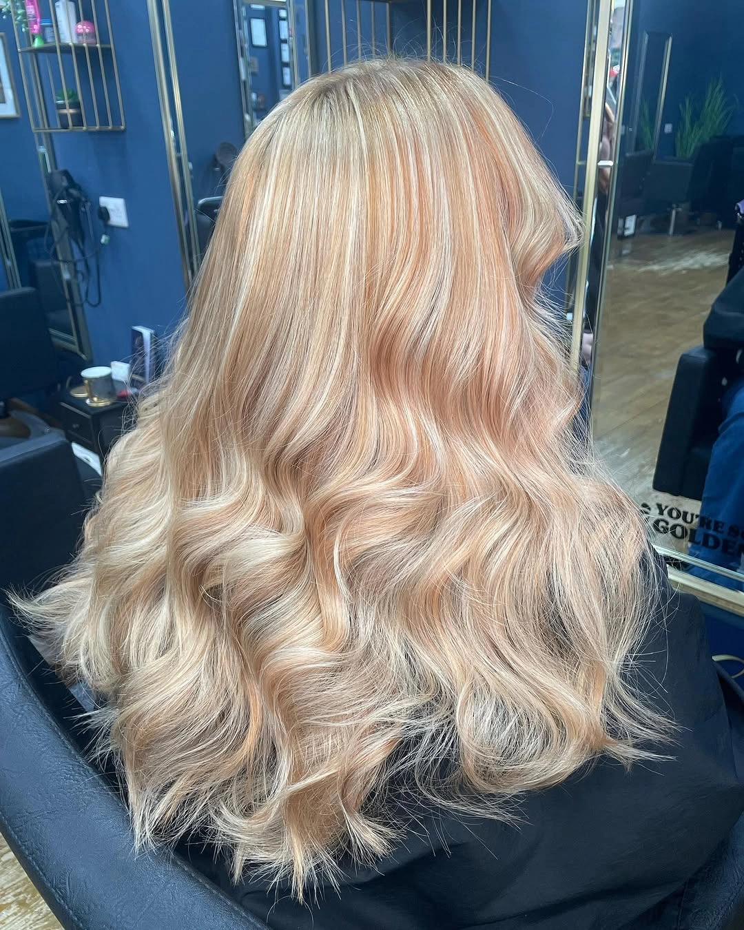 Long champagne blonde hair with loose back waves