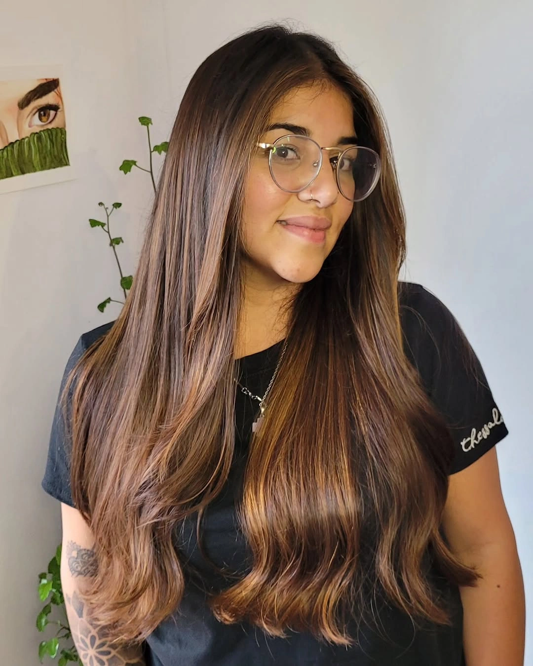 Long brunette hair with broad caramel face-framing panels