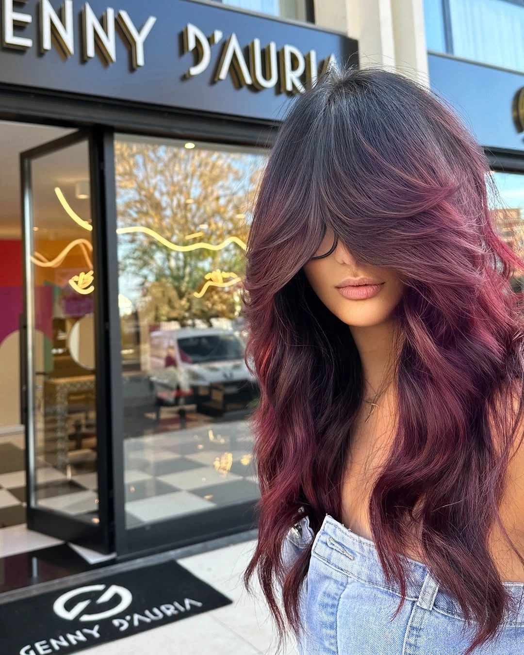 Long layered hair with smoky crown and plum-magenta lengths