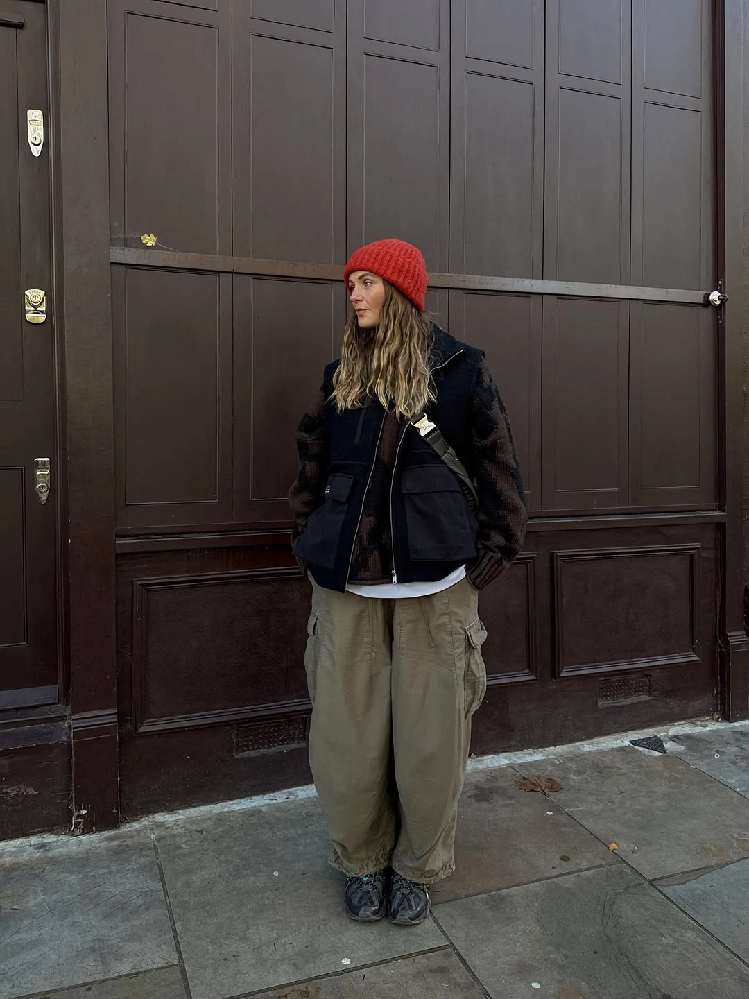 Structured blazer, long wool coat, tailored trousers, and loafers
