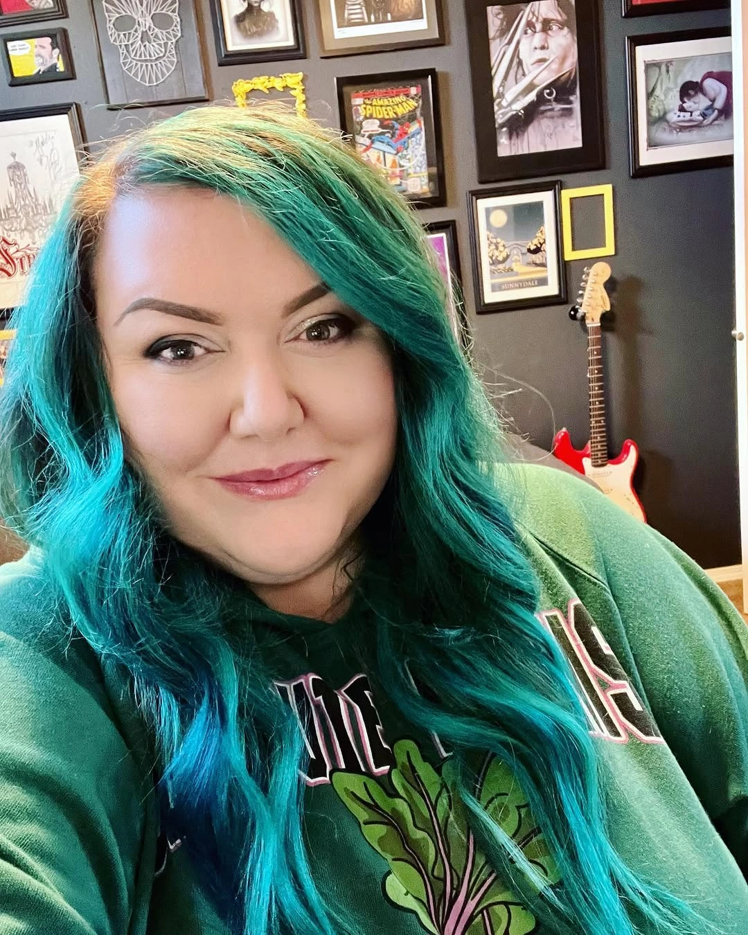 Long teal waves with deep side part and darker ends