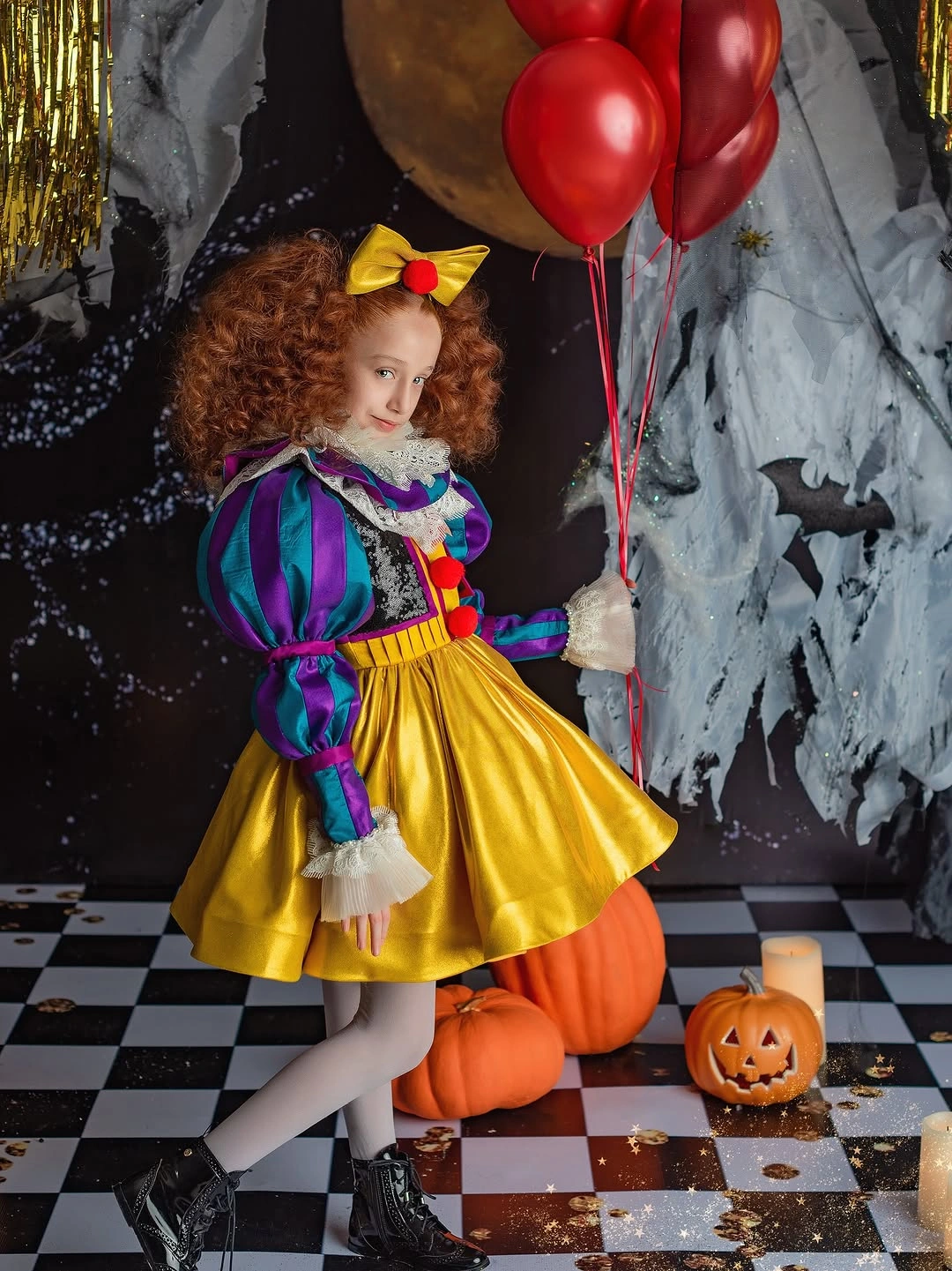 Girl in yellow blue and red Snow White-inspired Halloween costume