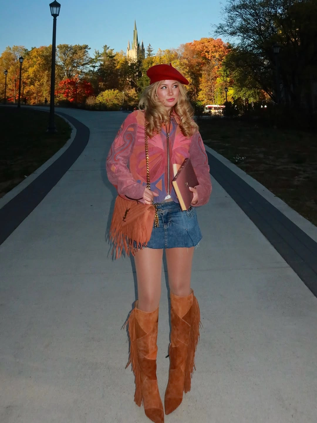 Red beret pink jacket denim mini skirt tan fringe boots