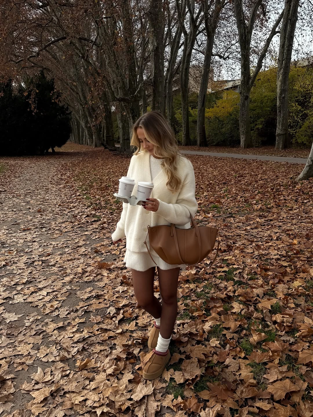 Cream oversized sweater brown tights tan boots white socks