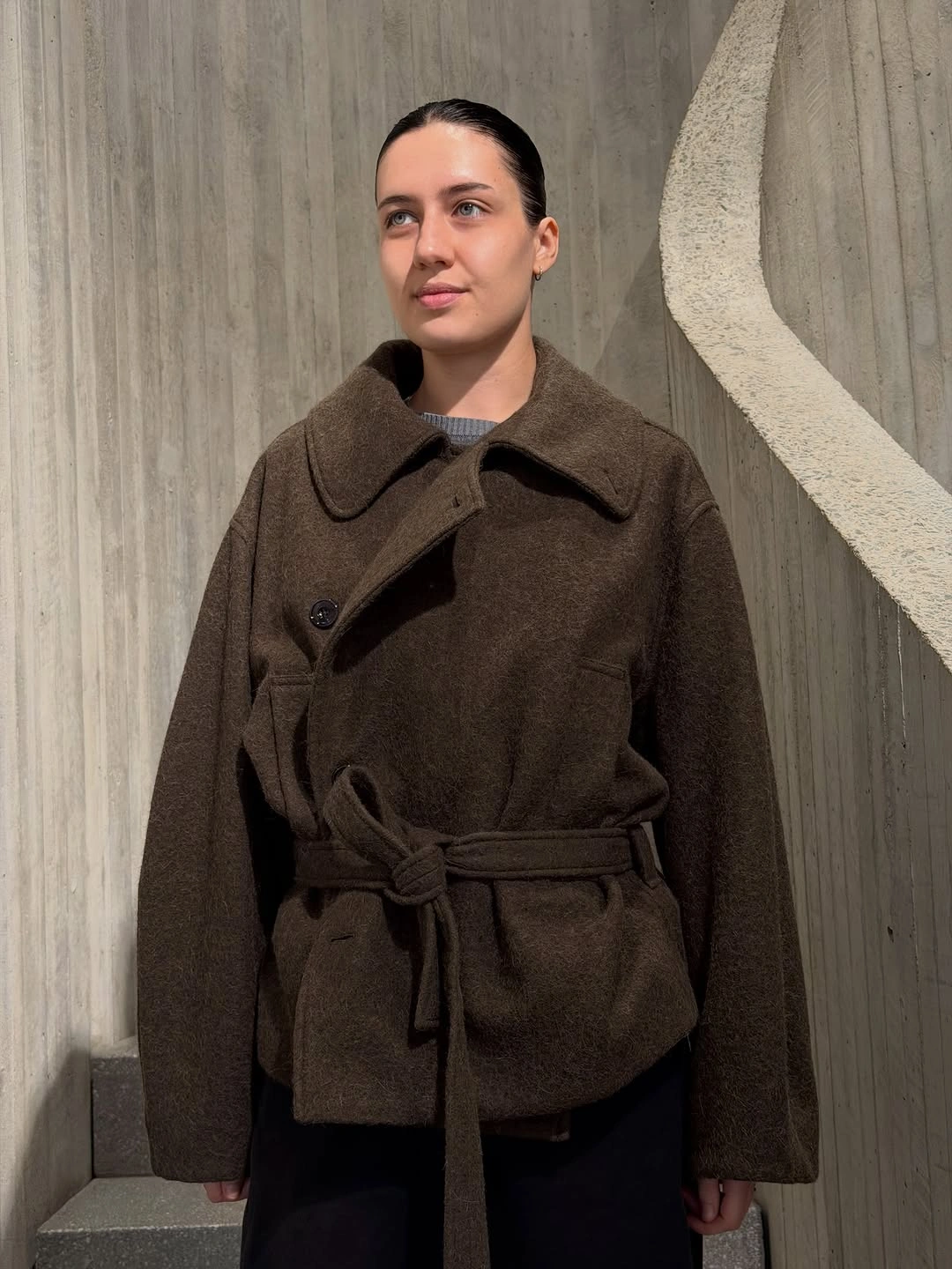 Short dark brown belted coat with rounded collar and black layers