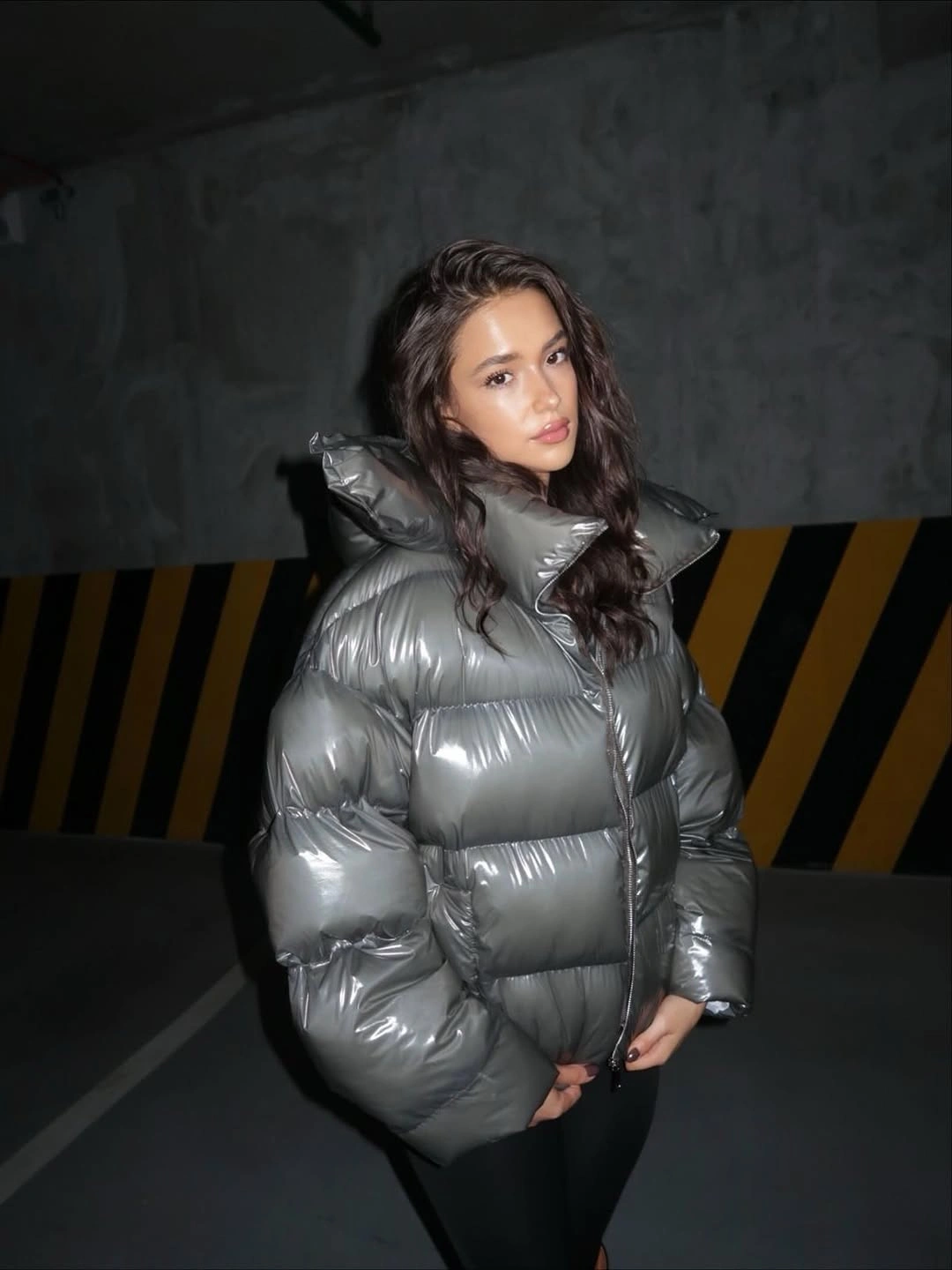 Silver metallic cropped puffer with black lower outfit