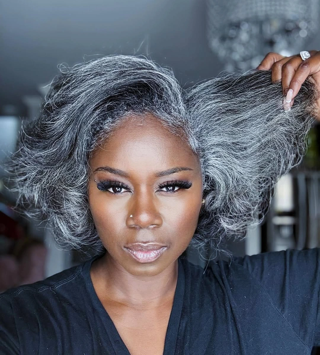 Short silver-gray textured hair with lifted sides and side sweep