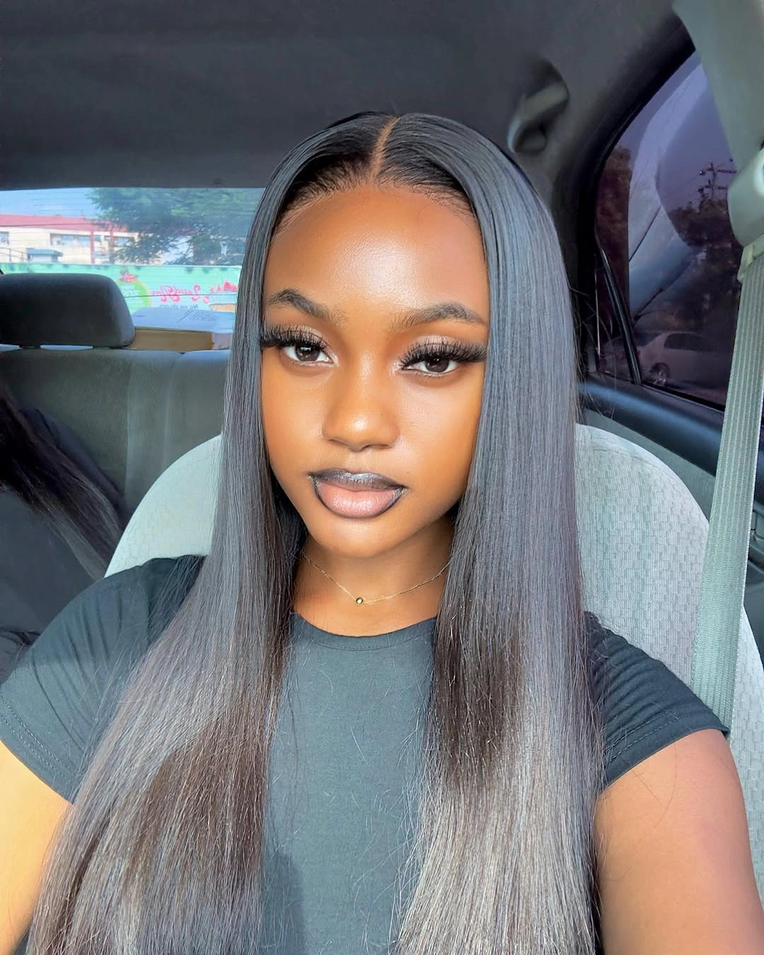 Long straight silver-gray hair with clean center part