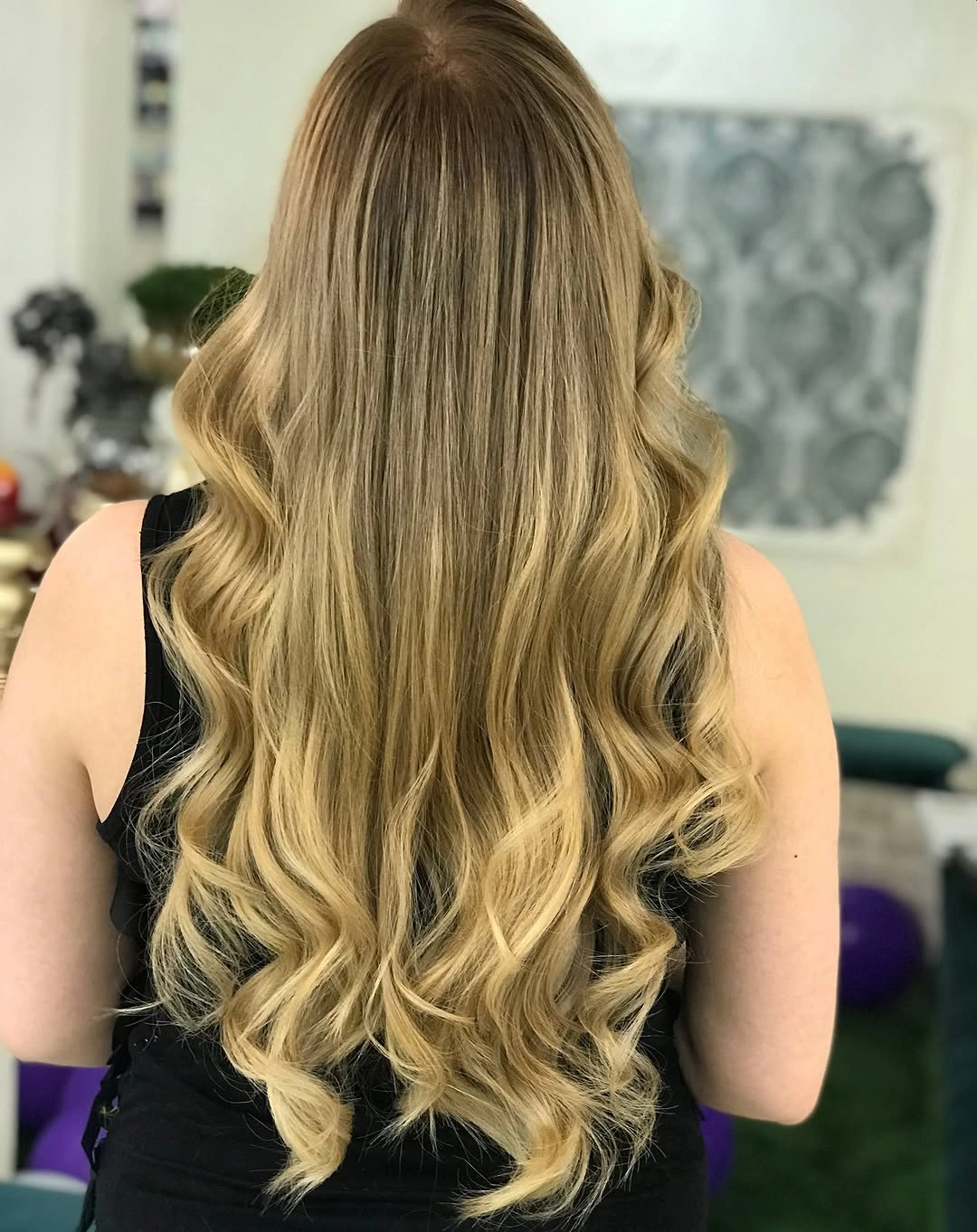 Very long blonde hair with smooth top and wavy ends