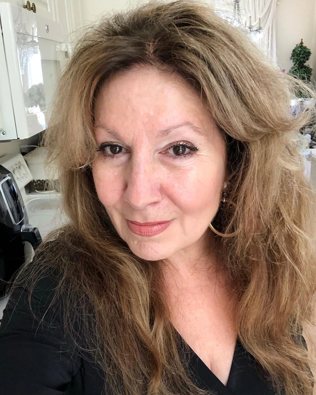 Long light brown hair with lifted crown and soft bends