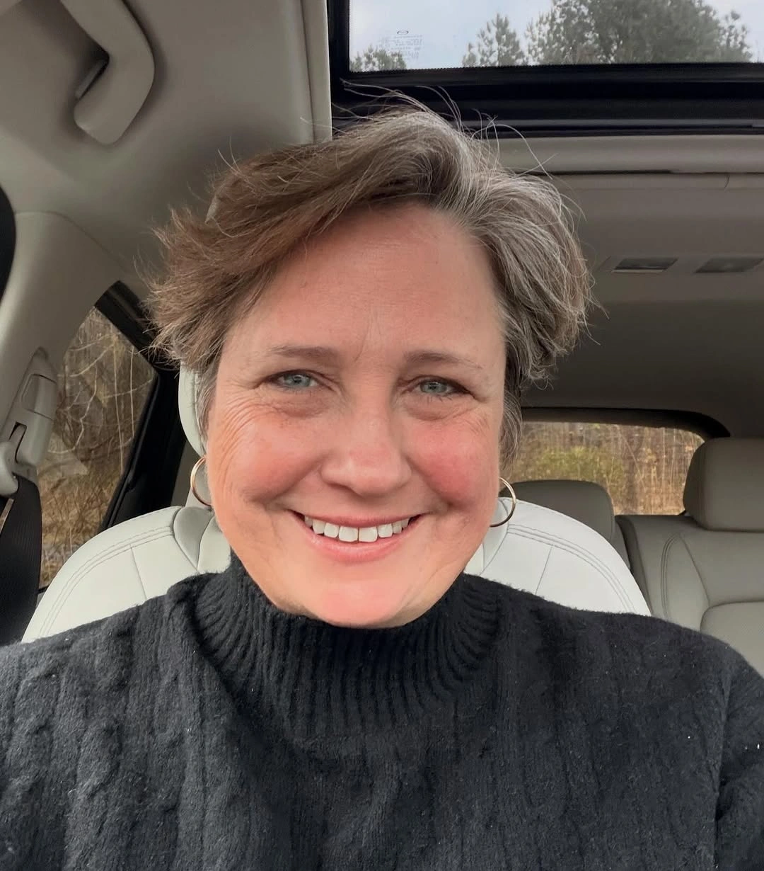 Short gray brown crop with side swept textured top
