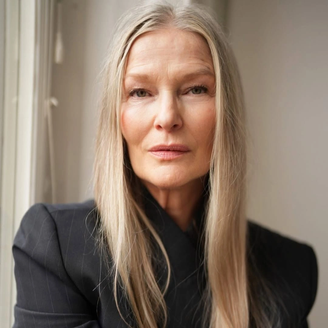Long pale blonde gray hair with center part
