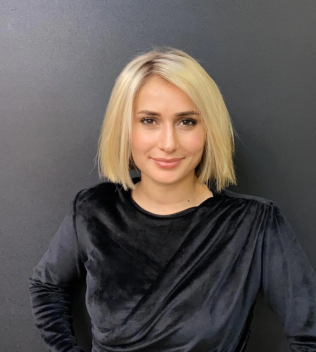 Pale blonde short straight hair with clean lower edge