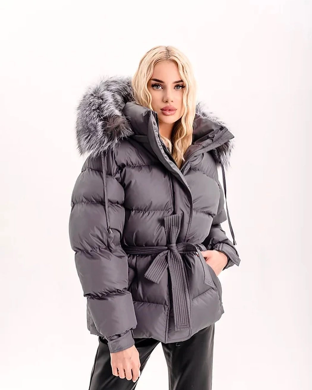 Gray belted puffer jacket with furry-looking hood trim