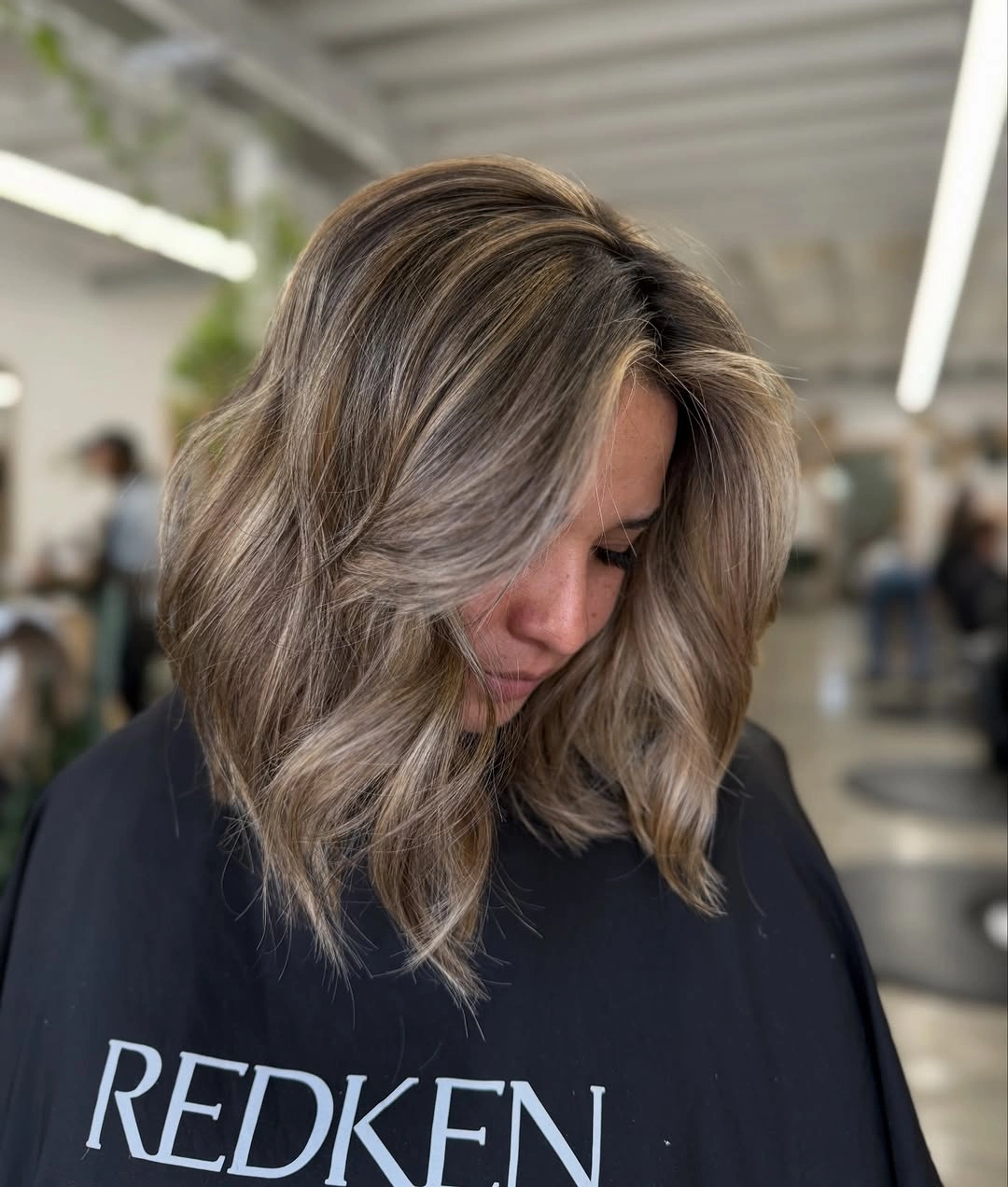 Shoulder-length brunette waves with taupe beige ribbons